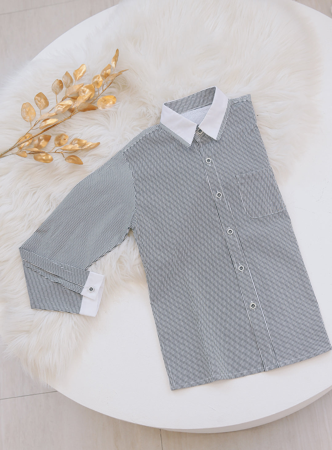 Striped black long-sleeved shirt
