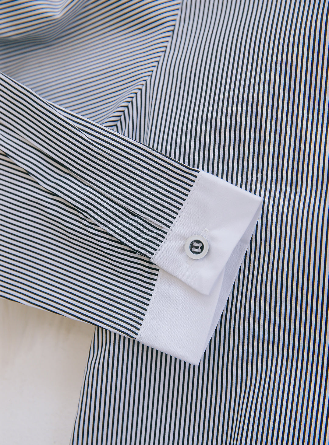 Striped black long-sleeved shirt