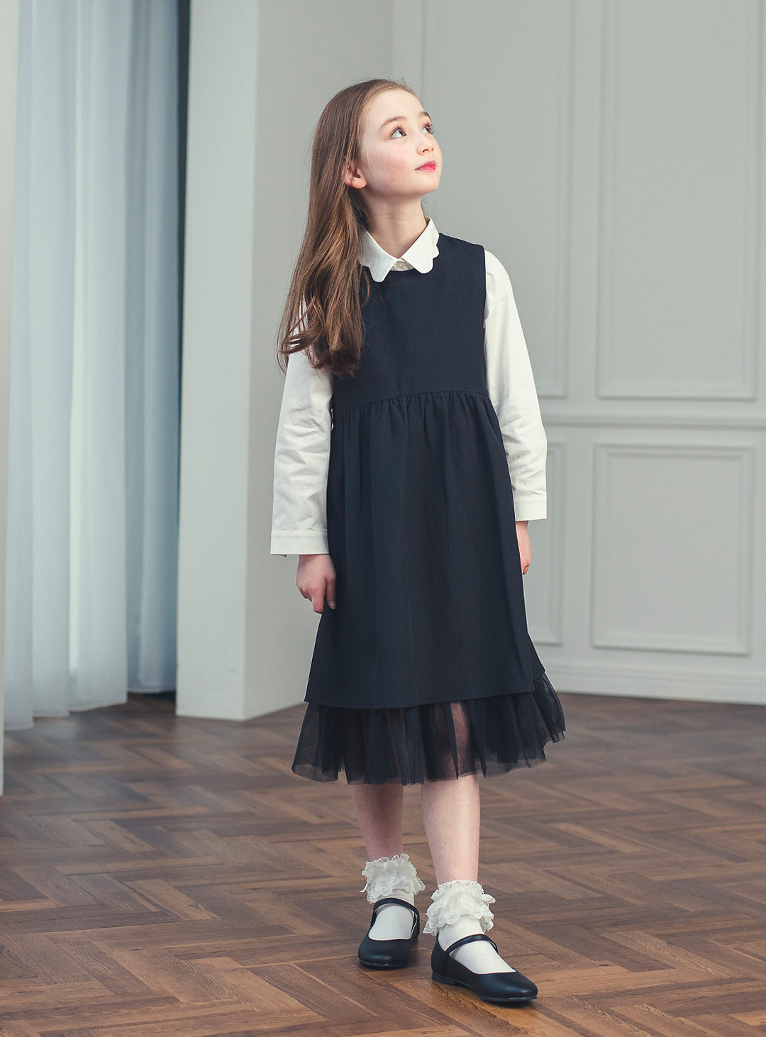 K118 - Shadow ruffle black dress