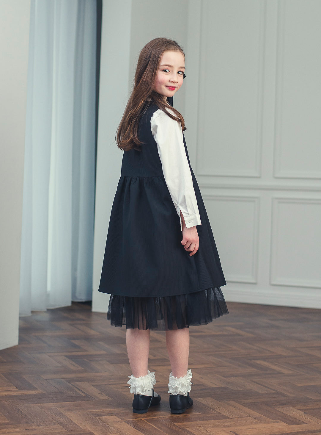K118 - Shadow ruffle black dress