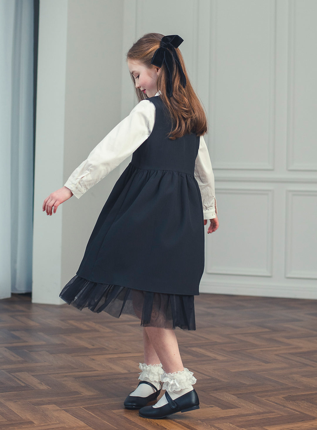 K118 - Shadow ruffle black dress