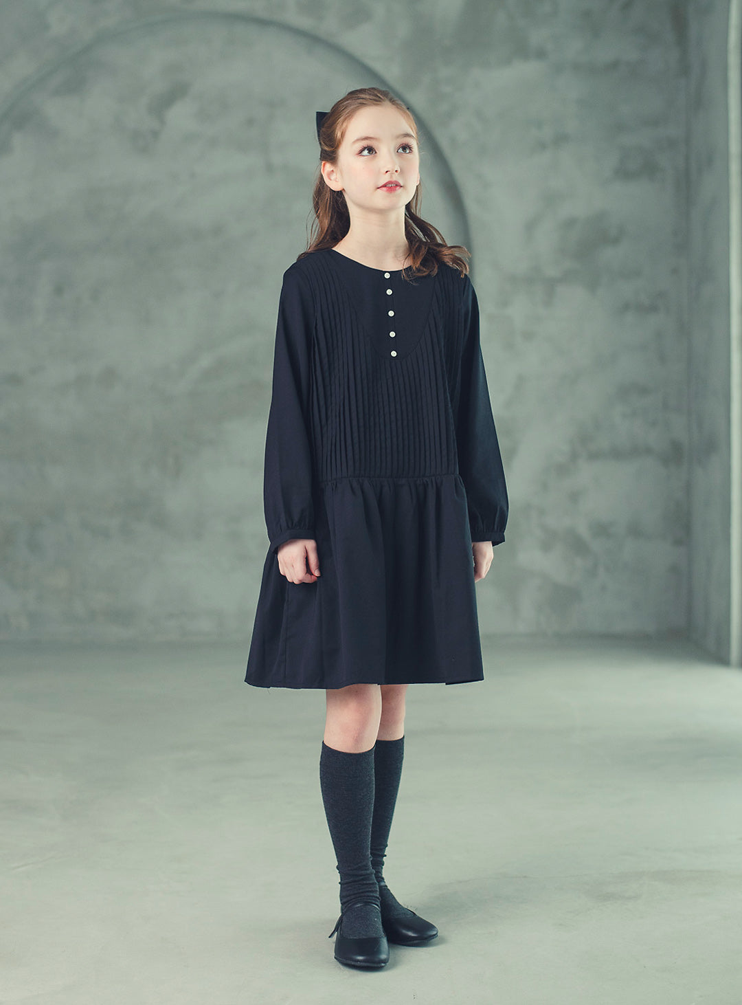 K512 - Round neck black pleated transitional dress