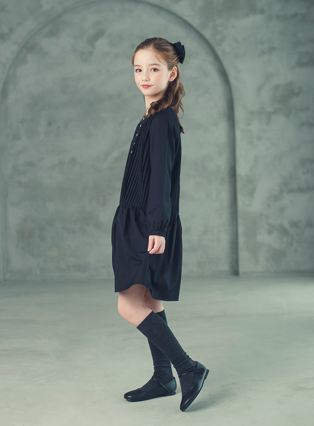 K512 - Round neck black pleated transitional dress