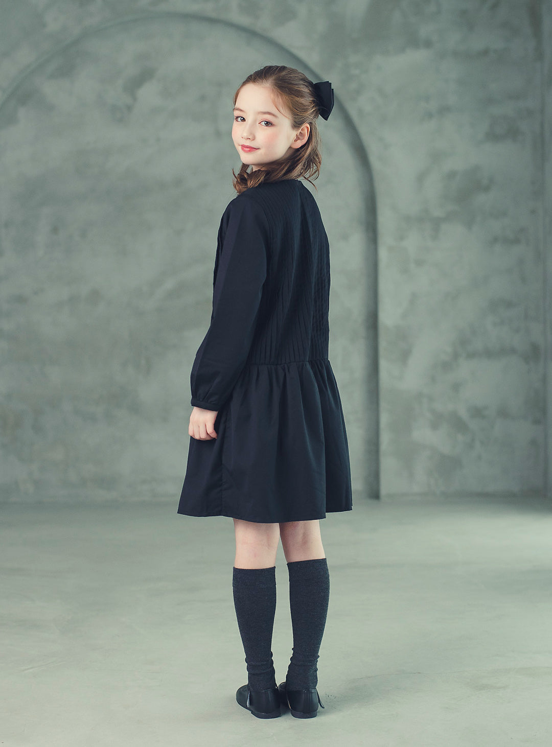 K512 - Round neck black pleated transitional dress