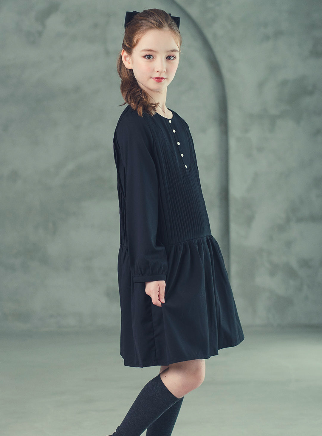 K512 - Round neck black pleated transitional dress