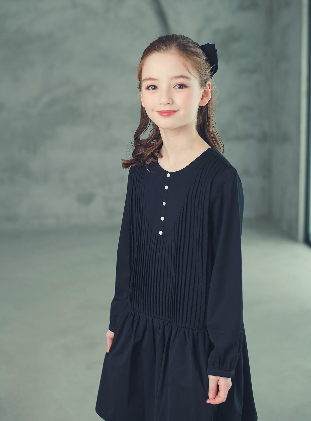 K512 - Round neck black pleated transitional dress