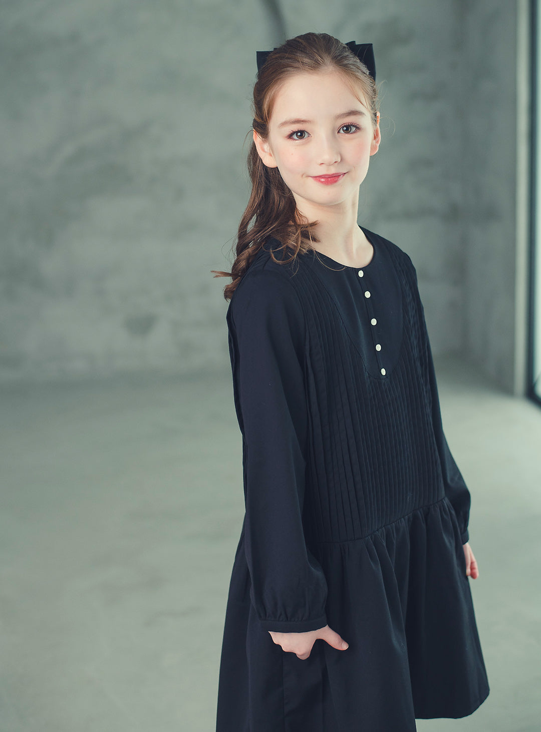 K512 - Round neck black pleated transitional dress