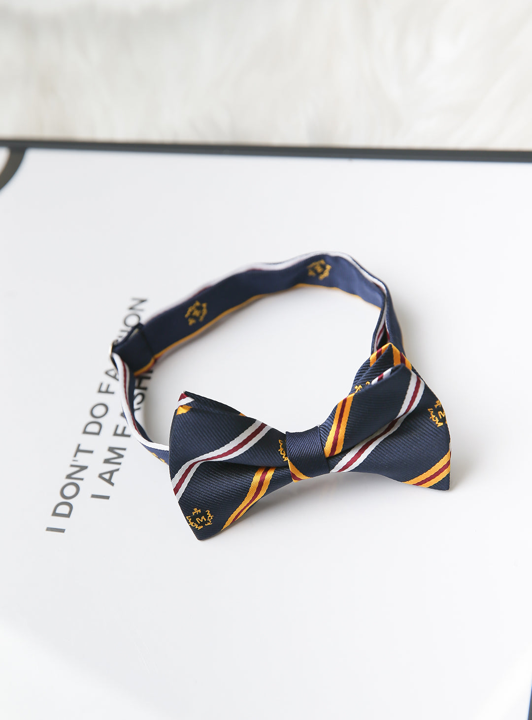 Navy, yellow and white regimented stripe bow tie