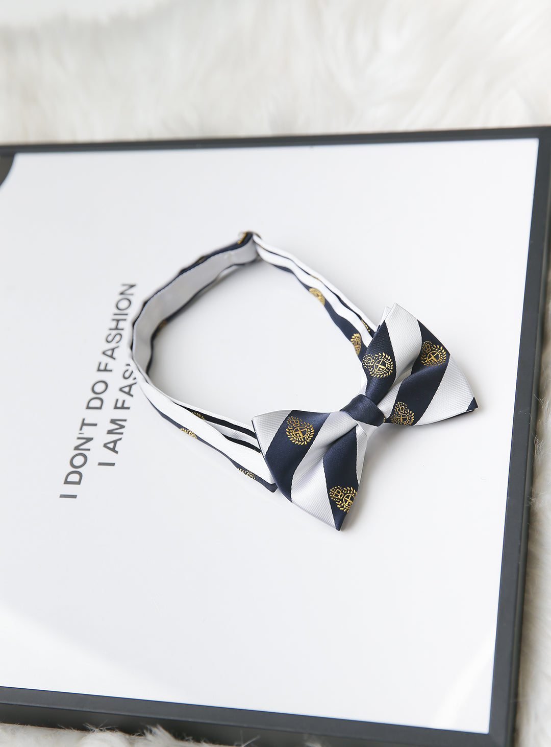 White and navy regimented stripe bow tie