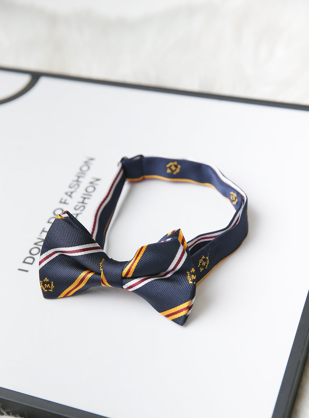 Navy, yellow and white regimented stripe bow tie