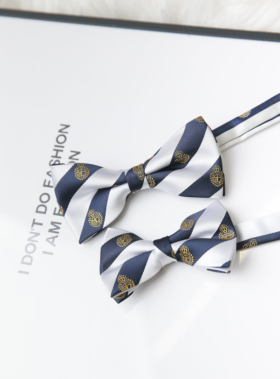 White and navy regimented stripe bow tie