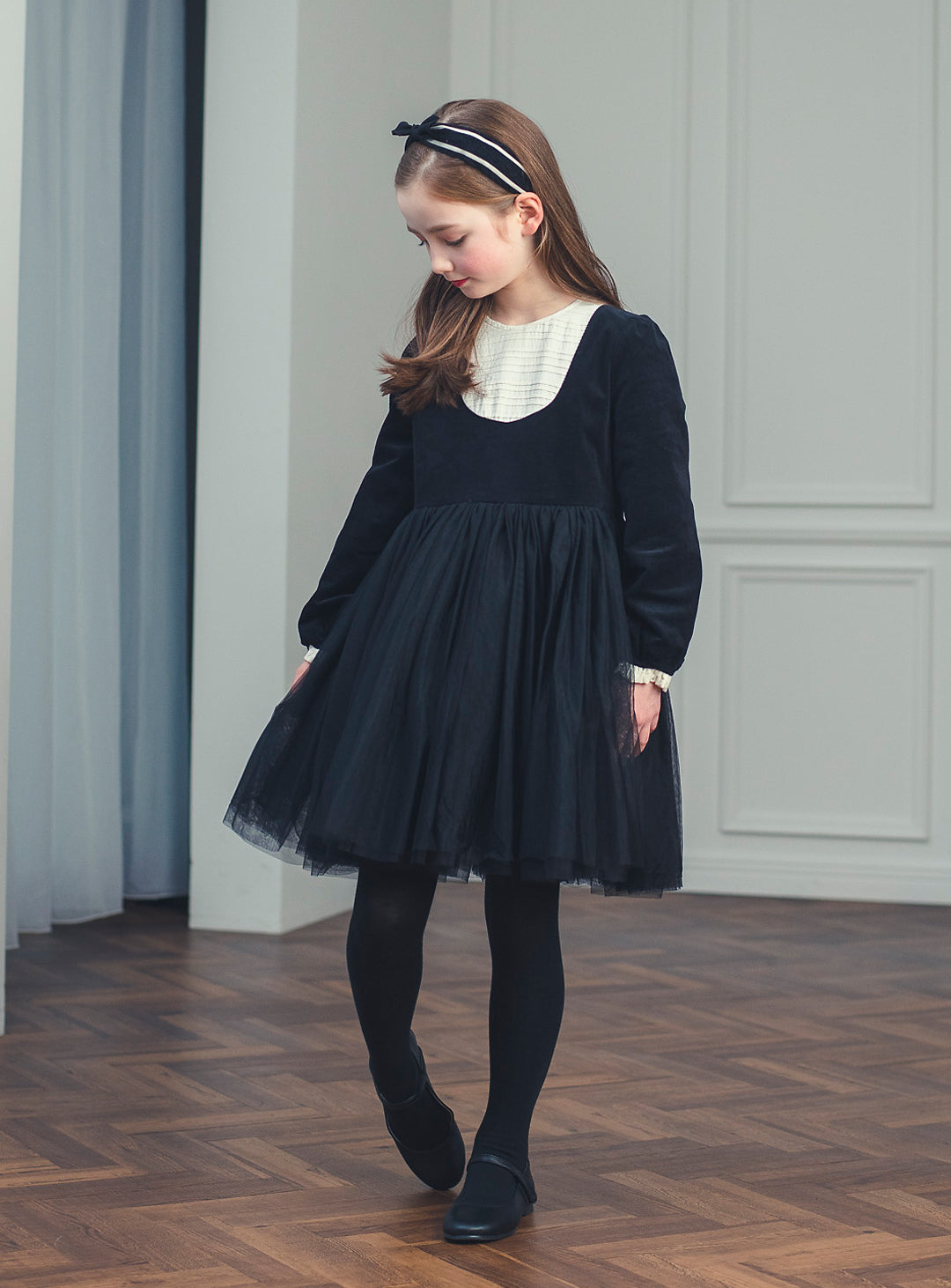 K113 - Black tulle bib yoke dress