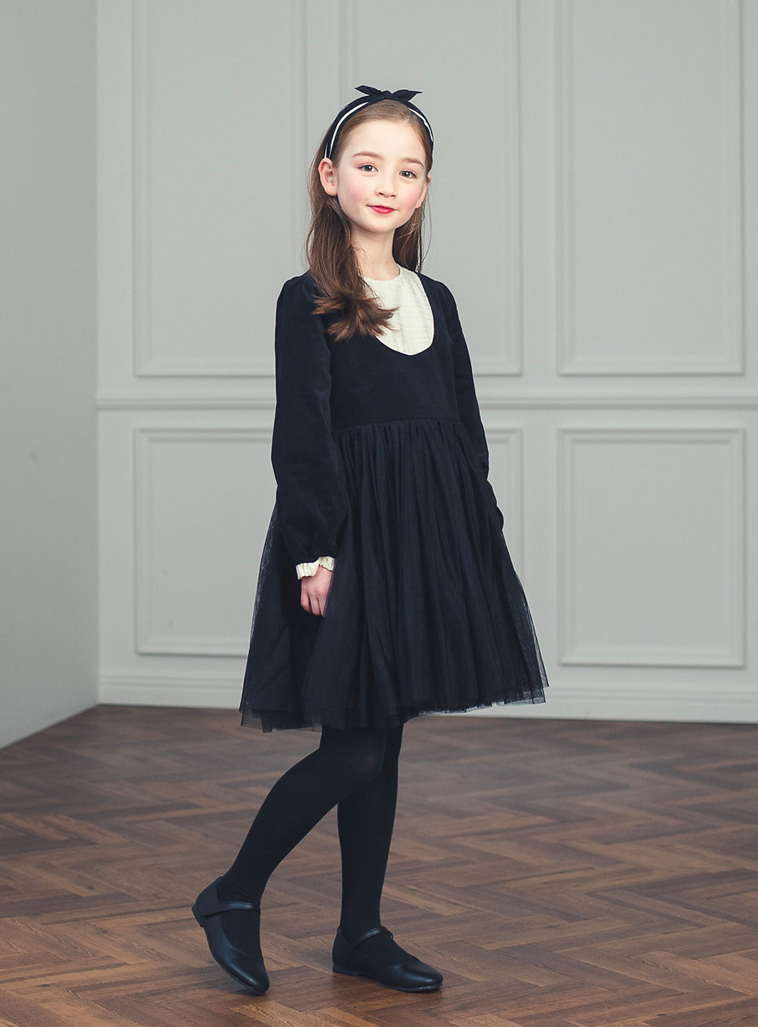 K113 - Black tulle bib yoke dress